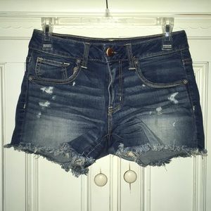 Dark wash distressed jean shorts